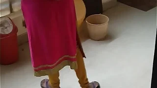 Boy rubbing his pennies infront of maid